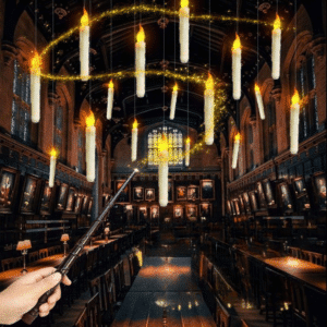Bougies flottantes dans la pièce célèbre de l'école des sorciers d'Harry Potter, avec une main tenant une baguette magique faisant de la lumière autour des bougies