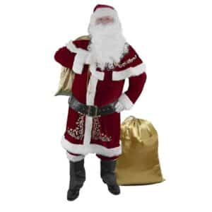 Homme portant un déguisement de Père Noël avec motifs dorés. La veste est longue jusqu'aux genoux en velours rouge et aux bordures blanches. Des motifs dorés se trouvent de chaque côté. Sur les épaules, il porte une petite cape assortie. Dans son dos un sac doré ainsi que derrière sa jambe gauche. Le tout sur fond blanc.