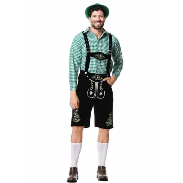 Homme portant un déguisement bavarois traditionnel pour oktoberfest sur fond blanc